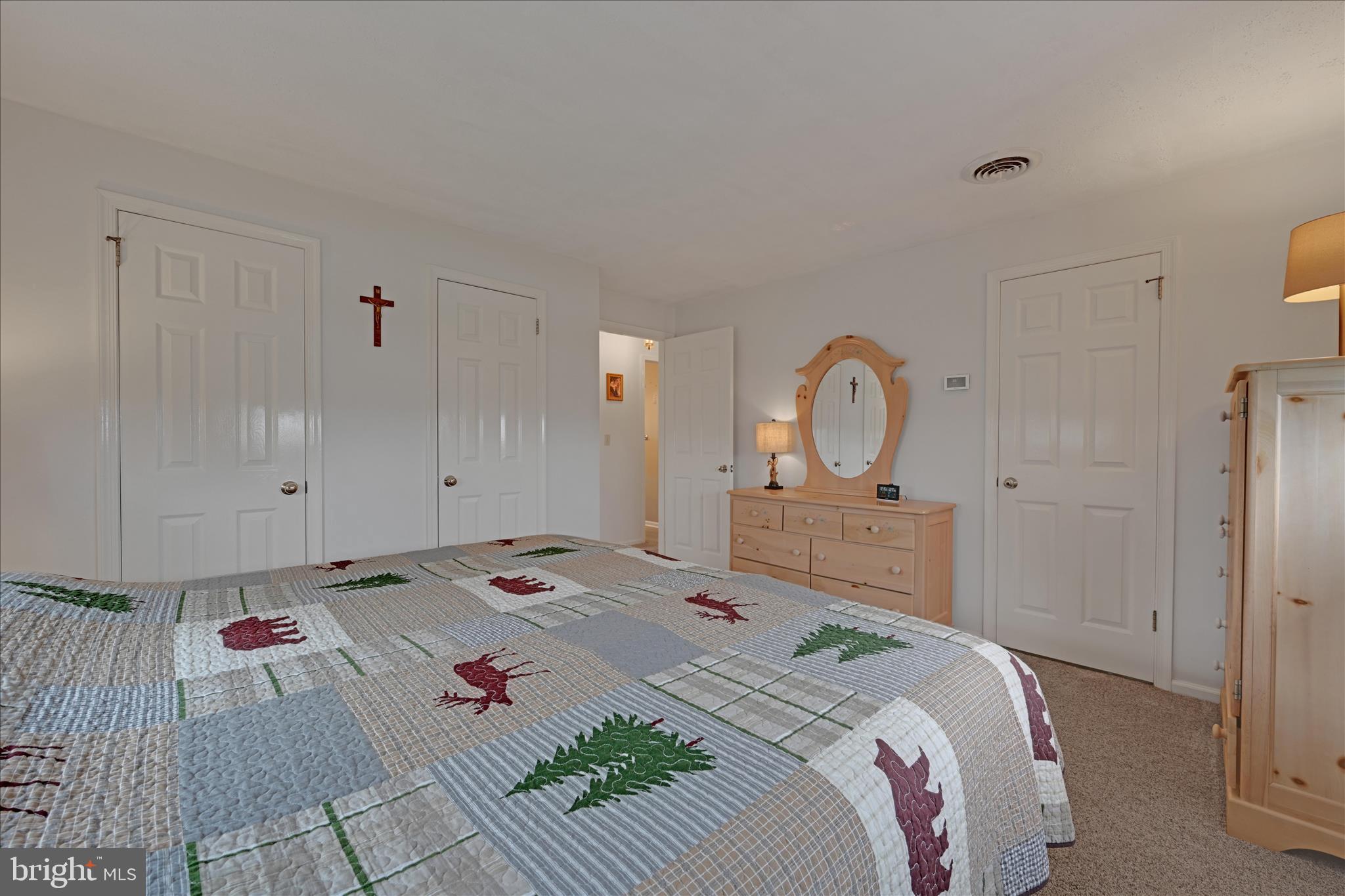 460 Shirksville Road Jonestown, PA 17038 - Photo 19 of 42 a bed room with a bed and a painting on the wall