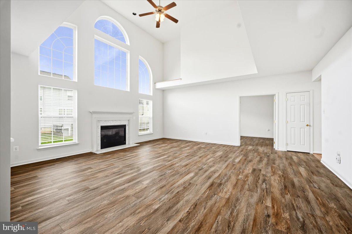 27 Sparkling Brook Road Ranson, WV 25438 - Photo 11 of 51 a view of empty room with wooden floor and fireplace