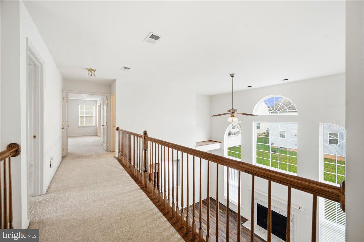 27 Sparkling Brook Road Ranson, WV 25438 - Photo 32 of 51 a view of a hallway with windows