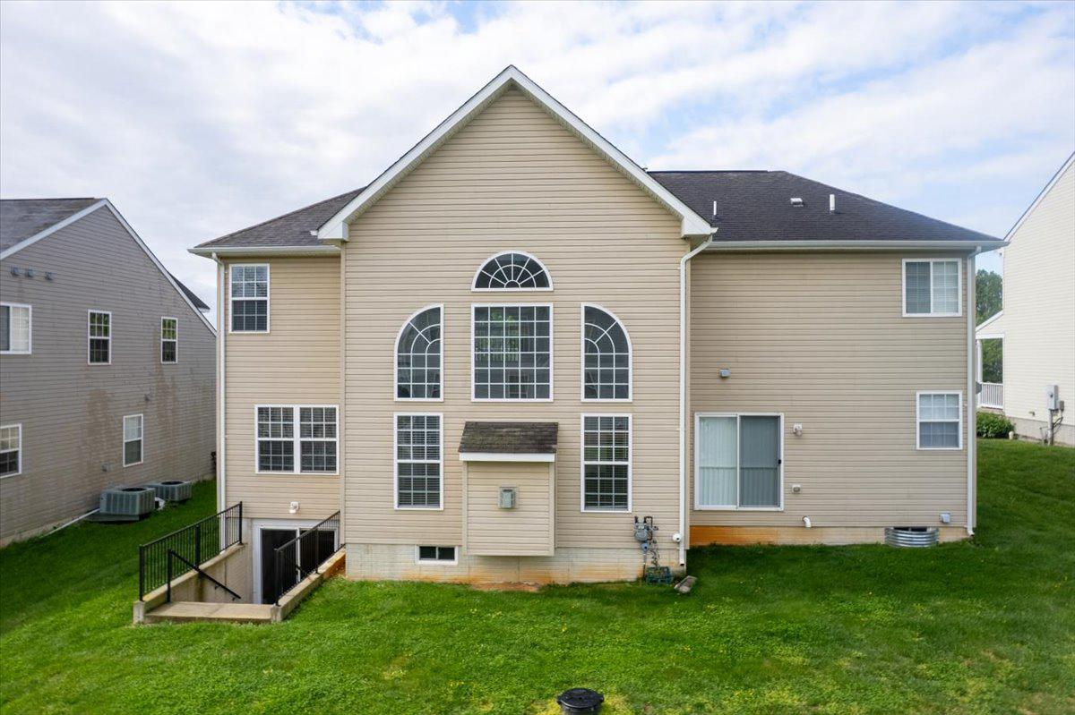 27 Sparkling Brook Road Ranson, WV 25438 - Photo 4 of 51 front view of house with a yard