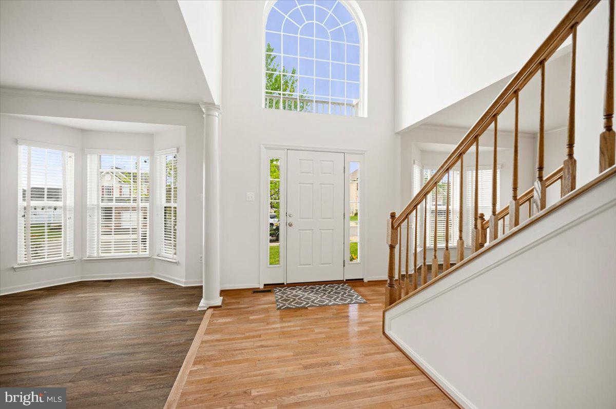 27 Sparkling Brook Road Ranson, WV 25438 - Photo 5 of 51 a view of an entryway with wooden floor and stairs