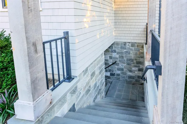 a view of balcony with wooden floor