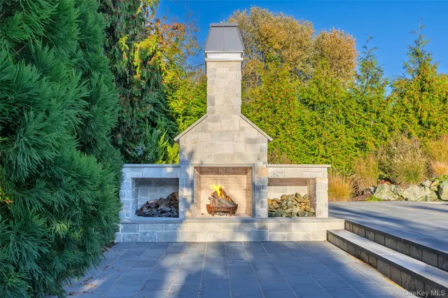 a view of a room with wooden floor and a window