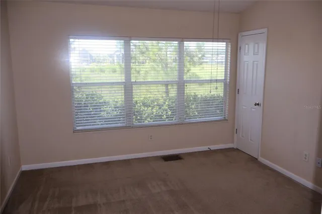 an empty room with a window