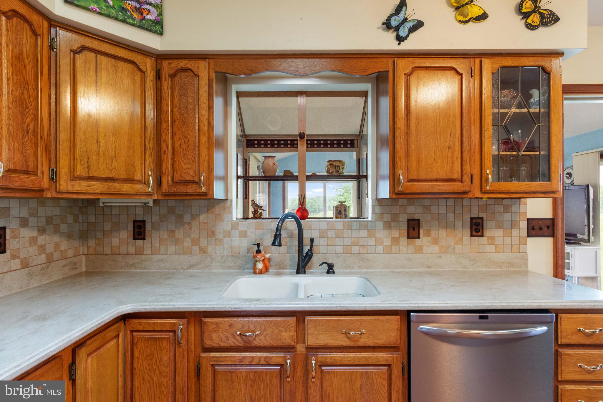 1424 Fish And Game Road Littlestown, PA 17340 - Photo 8 of 32 Neutral paint w/ light wood cabinets and flooring