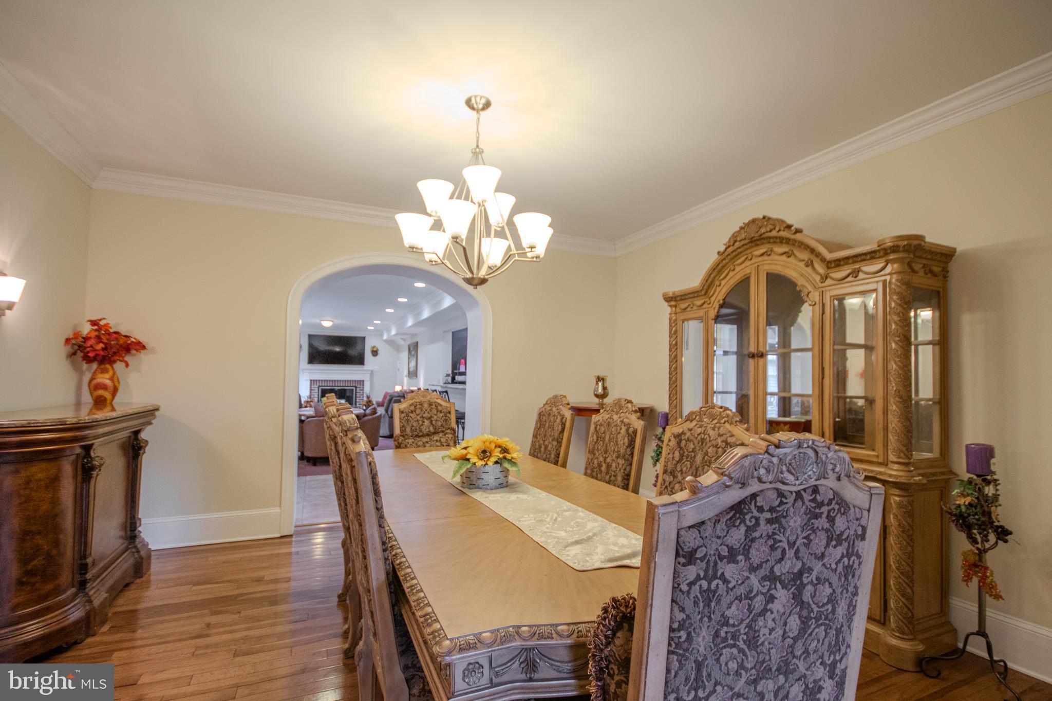 31008 Old Ocean City Road Salisbury, MD 21804 - Photo 12 of 65 a view of a dining room with furniture and wooden floor