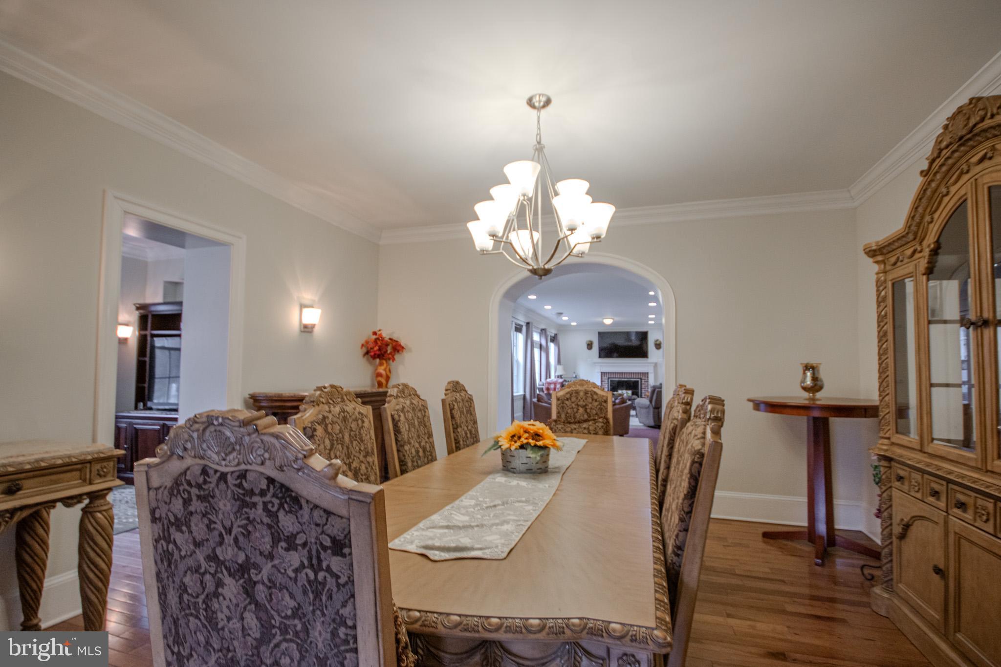 31008 Old Ocean City Road Salisbury, MD 21804 - Photo 13 of 65 a view of a dining room with furniture and chandelier