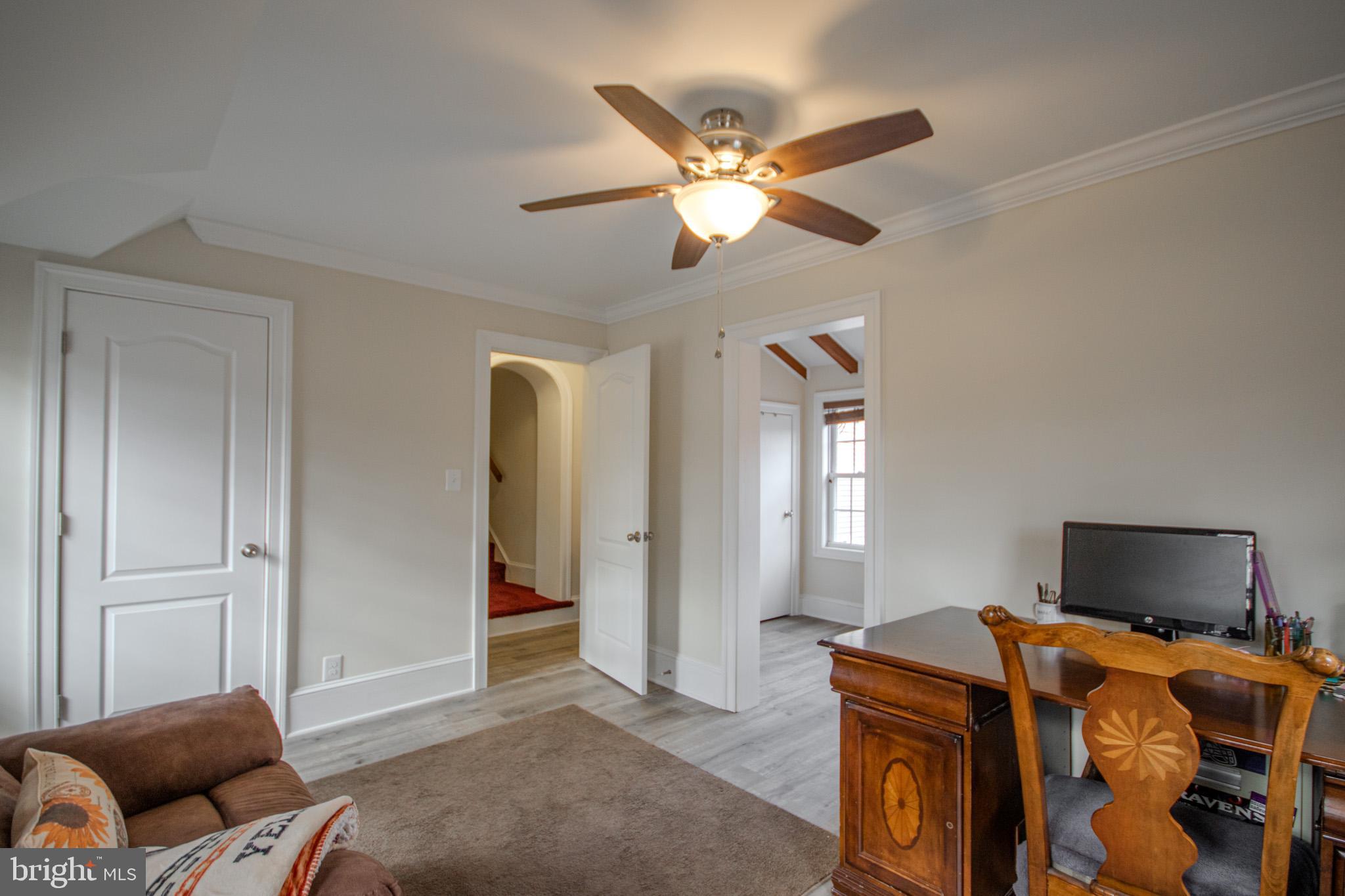 31008 Old Ocean City Road Salisbury, MD 21804 - Photo 41 of 65 a living room with furniture and a window