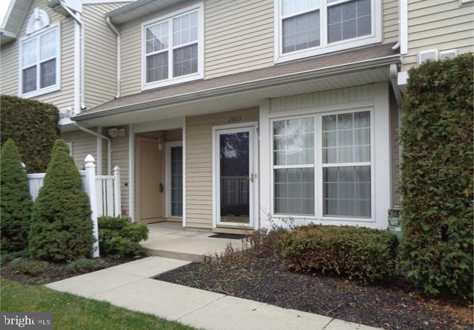 a front view of a house having yard