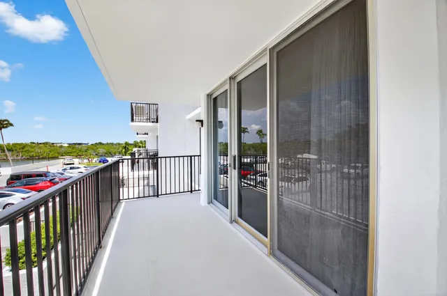 a view of a chairs and table in the patio