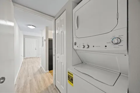 a bathroom with a toilet sink and shower