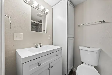 a view of a swimming pool with a lounge chair