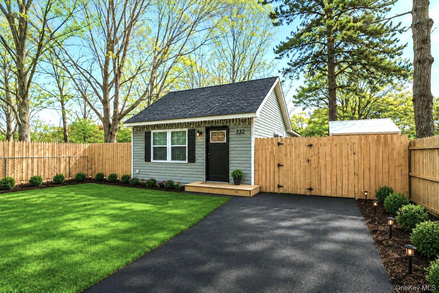 332 Commack Road Shirley, NY 11967 - Photo 2 of 25 a view of a house with a yard and tree