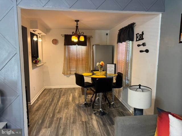 4603 Raleigh Road Temple Hills, MD 20748 - Photo 6 of 40 a living room with furniture and a table