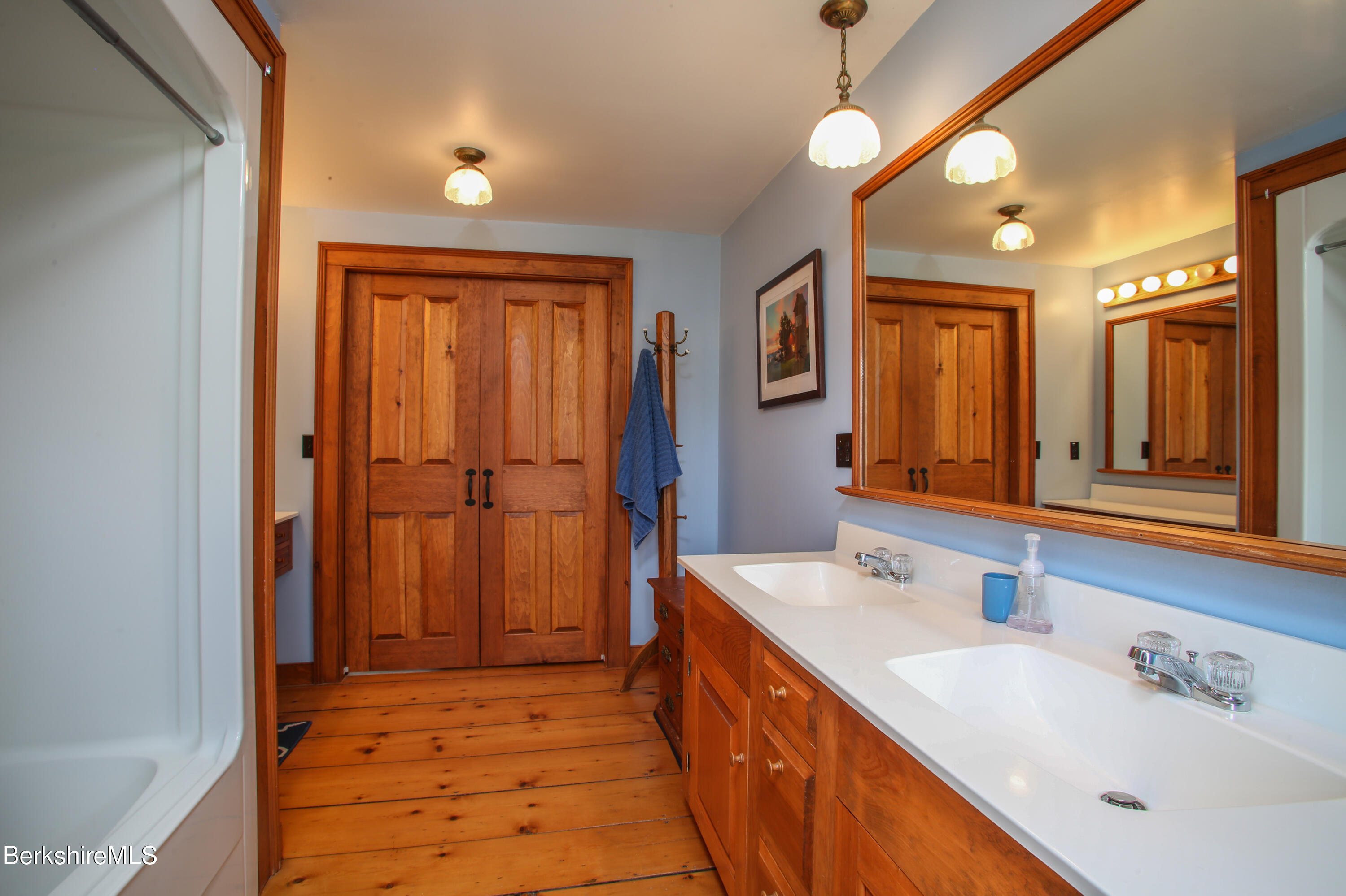 61 Sumner Stetson Road Heath, MA 01339 - Photo 13 of 34 a bathroom with a sink a mirror and a shower