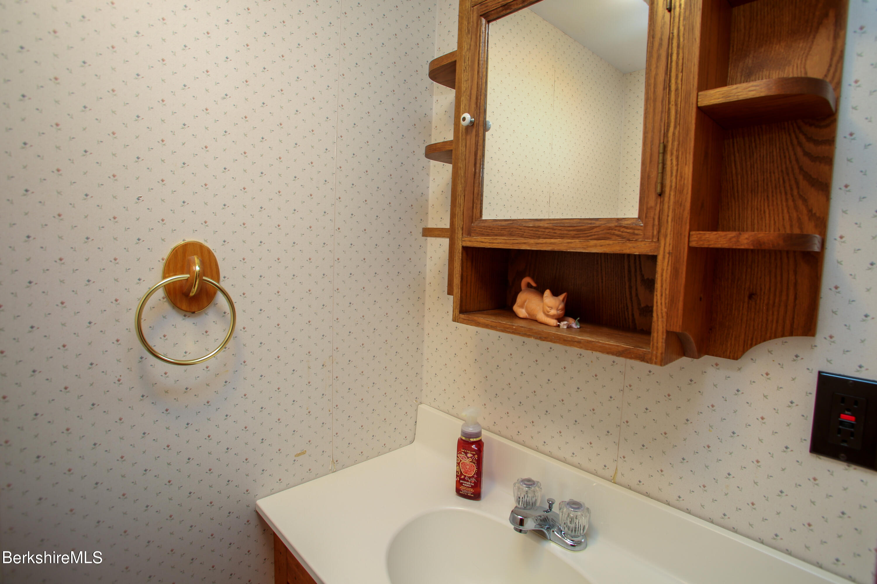61 Sumner Stetson Road Heath, MA 01339 - Photo 18 of 34 a bathroom with a sink and a mirror