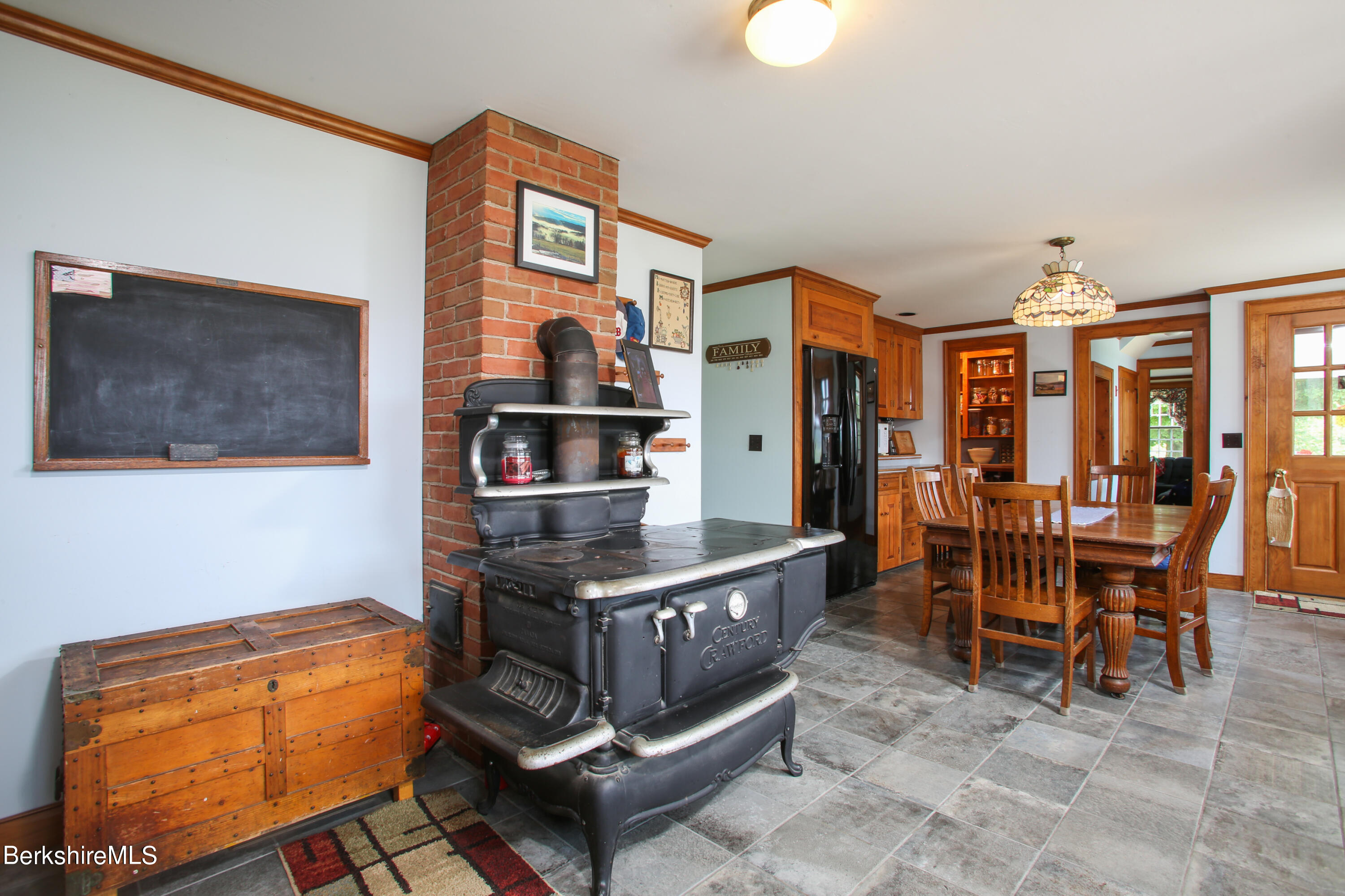 61 Sumner Stetson Road Heath, MA 01339 - Photo 7 of 34 a dining room with furniture and chandelier