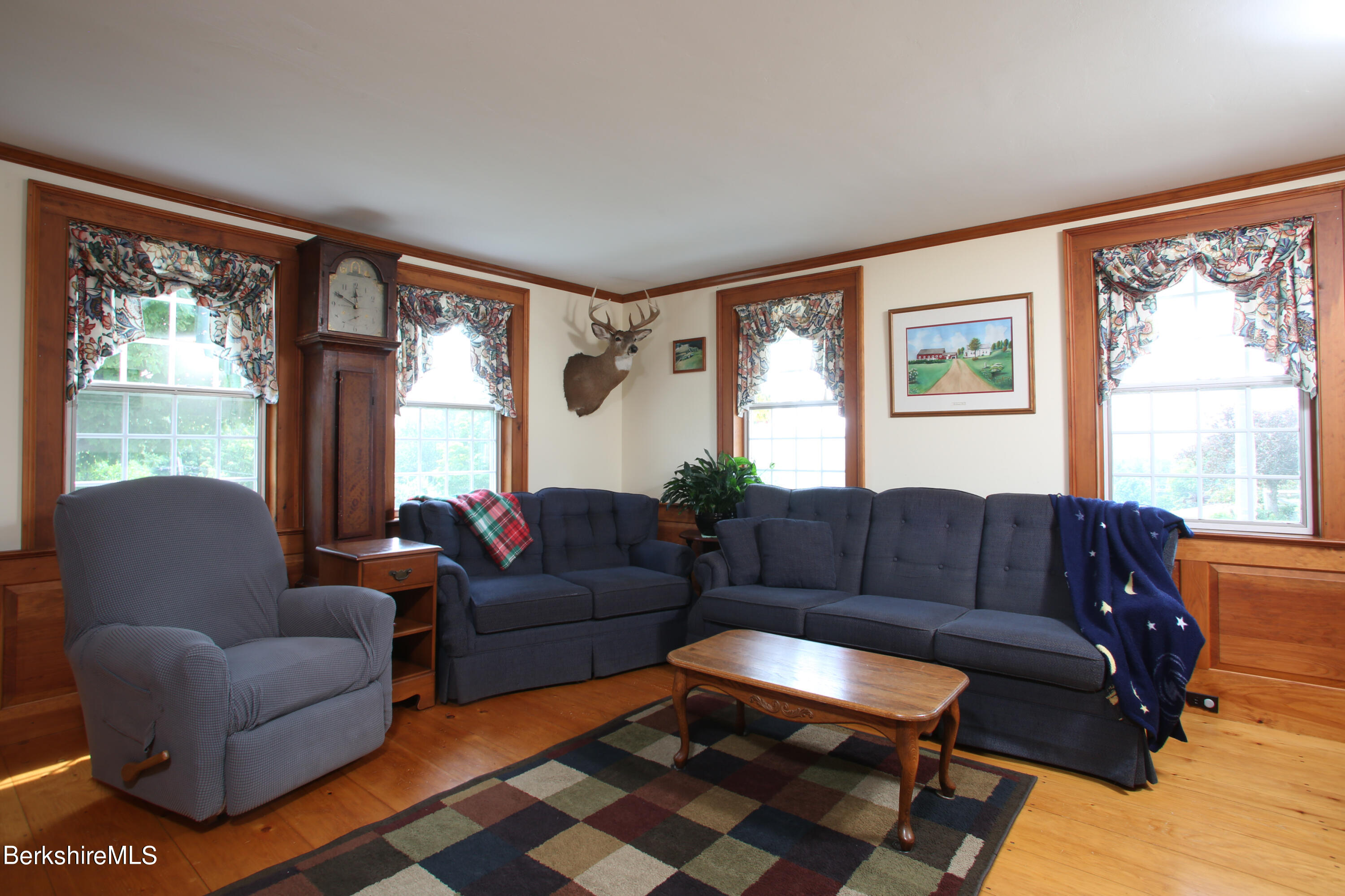 61 Sumner Stetson Road Heath, MA 01339 - Photo 10 of 34 a living room with furniture and a large window