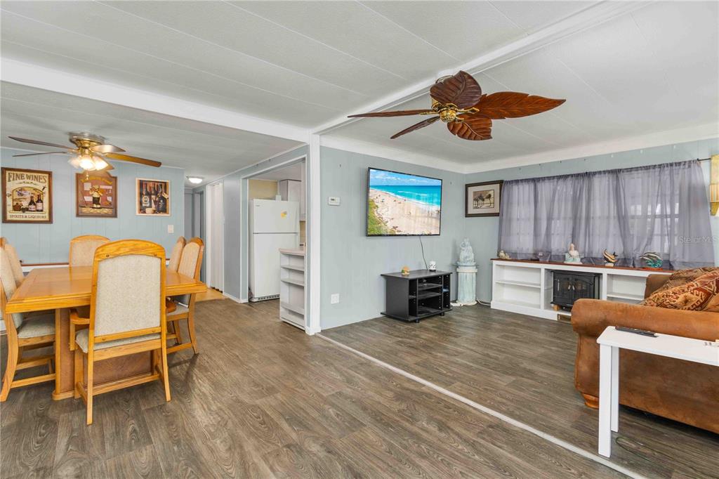 10399 67th Avenue North, Unit 4 St. Petersburg, FL 33708 - Photo 11 of 35 a view of kitchen with oven and chairs