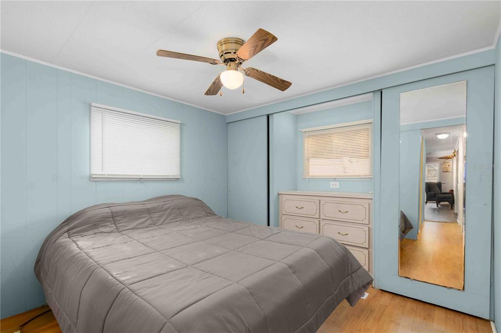 10399 67th Avenue North, Unit 4 St. Petersburg, FL 33708 - Photo 21 of 35 a bedroom with a large bed and a window