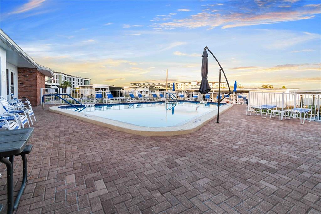 10399 67th Avenue North, Unit 4 St. Petersburg, FL 33708 - Photo 32 of 35 a view of a terrace with sitting space