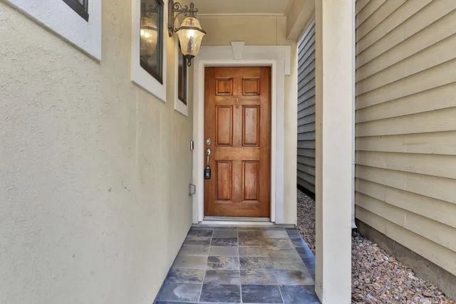 a view of a door and a window