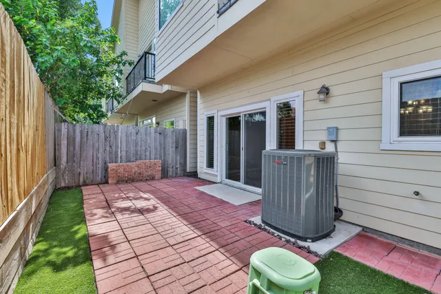 a view of a backyard with a tub