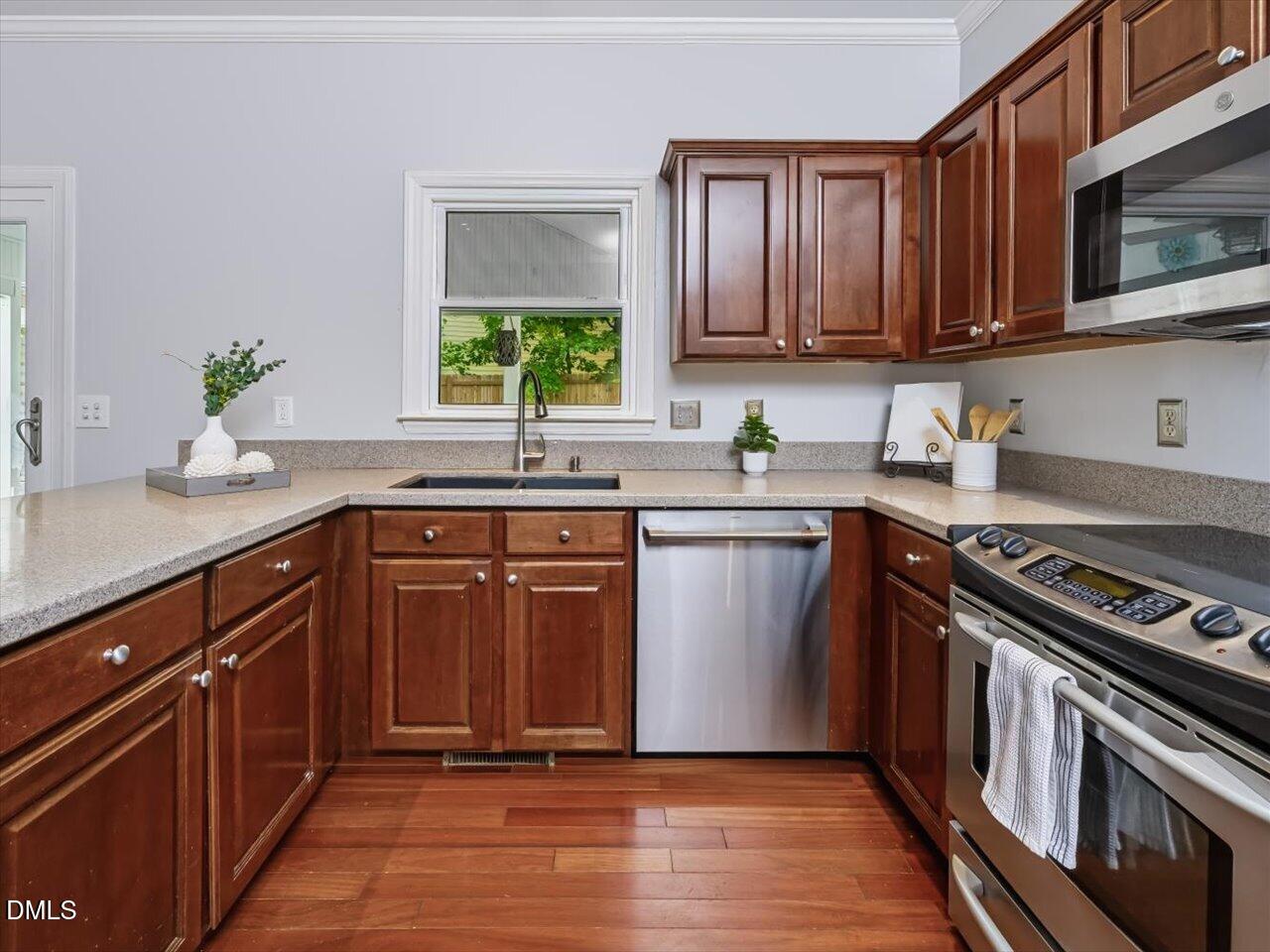 3404 Beaux Court Raleigh, NC 27616 - Photo 10 of 40 Newer Stainless Appliances & Granite Countertops