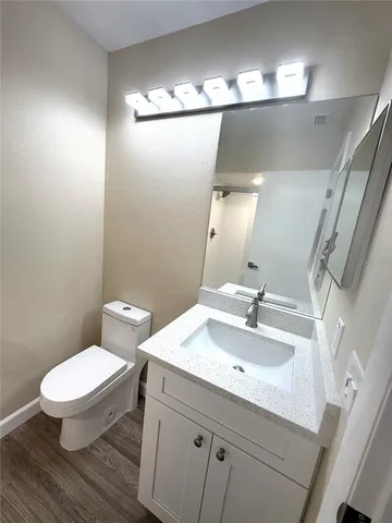 a bathroom with a glass door shower