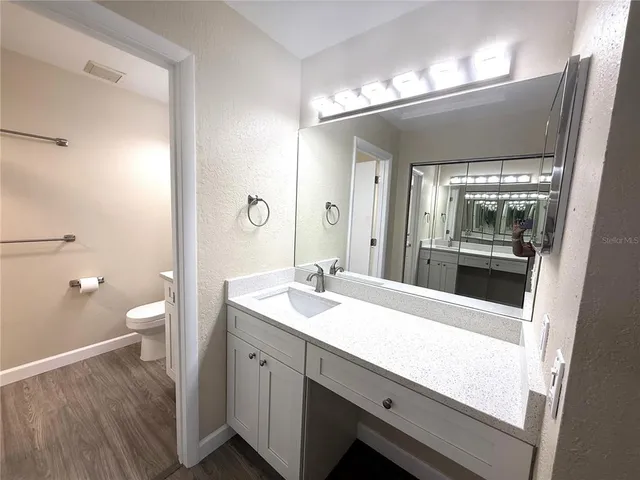 a view of a wooden fence