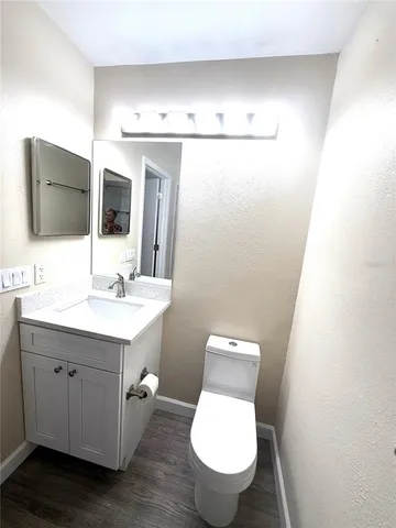 a view of a living room with a fireplace