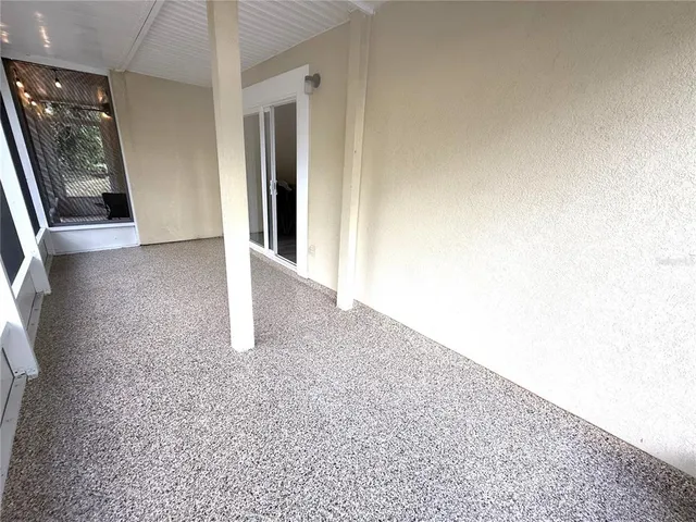 a view of a yard with trees