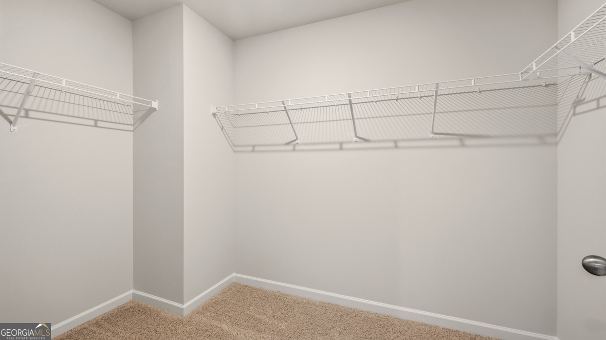 8578 Seabiscuit Road Lithonia, GA 30058 - Photo 23 of 30 a view of a closet