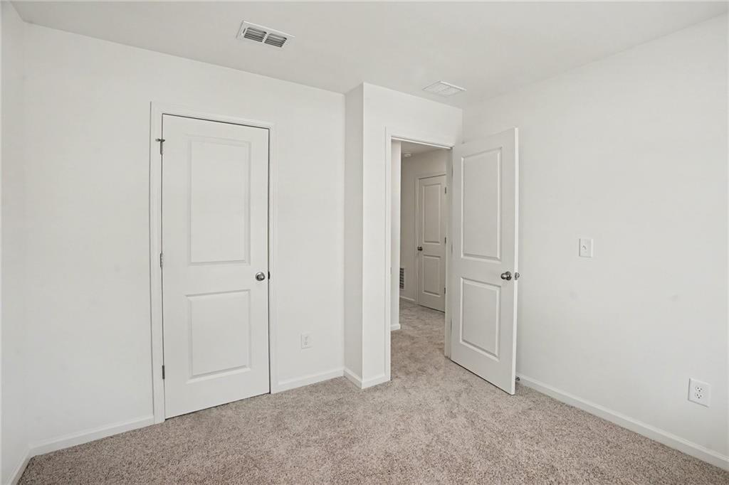 625 Jervis Way Locust Grove, GA 30248 - Photo 15 of 28 a view of an empty room
