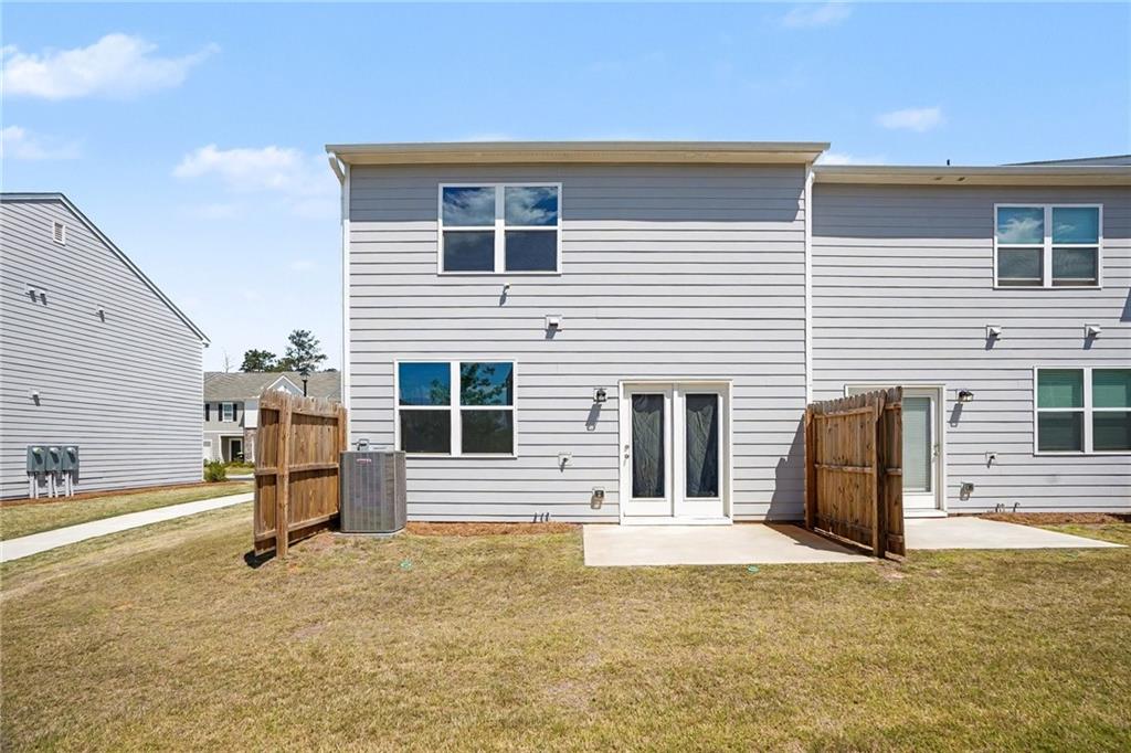 625 Jervis Way Locust Grove, GA 30248 - Photo 24 of 28 a view of a house with a backyard