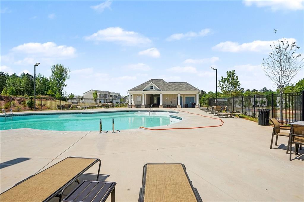 625 Jervis Way Locust Grove, GA 30248 - Photo 28 of 28 a view of house with outdoor space and seating