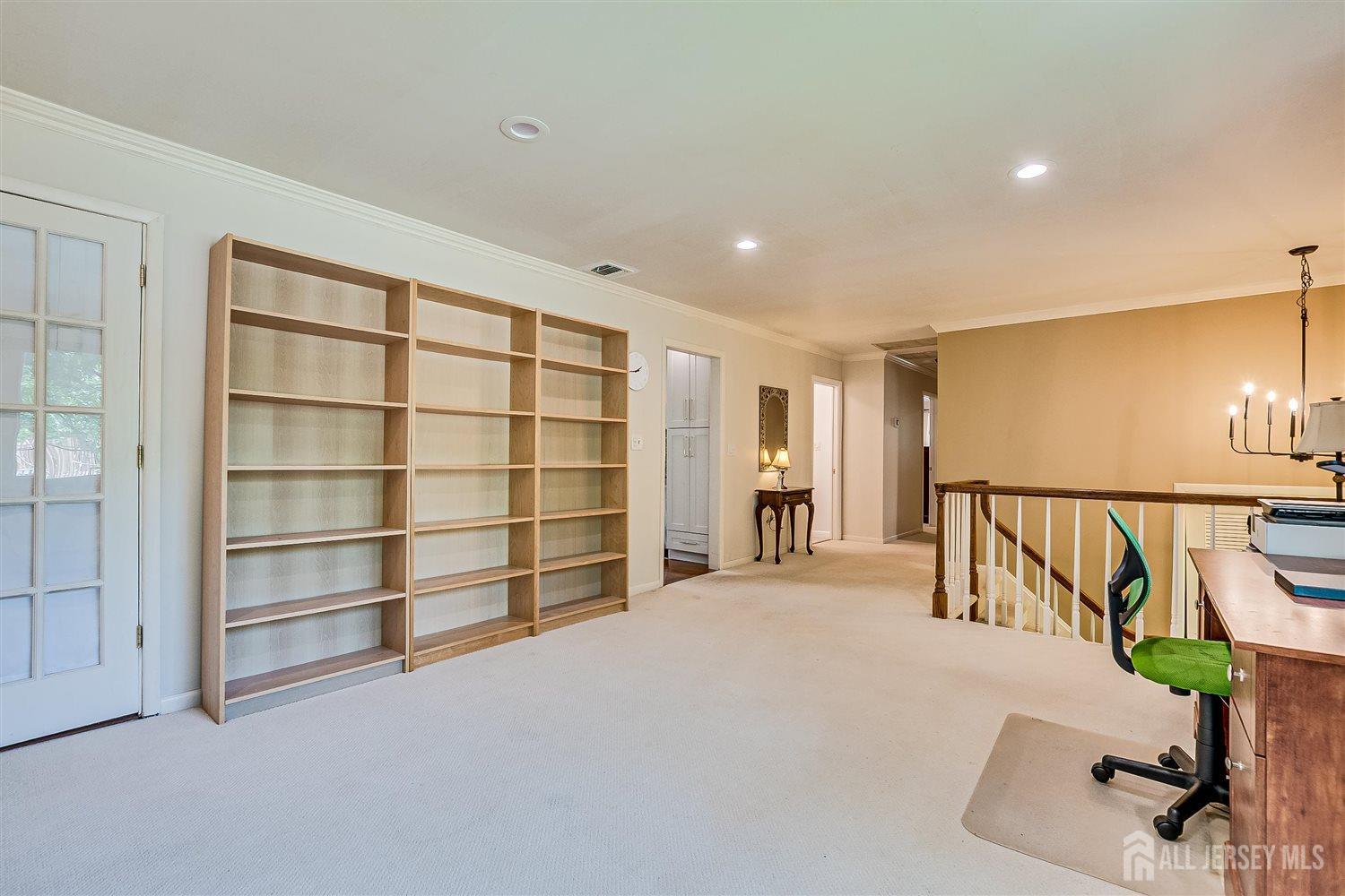 9 Fielding Place Edison, NJ 08820 - Photo 12 of 61 a view of an empty room with a staircase