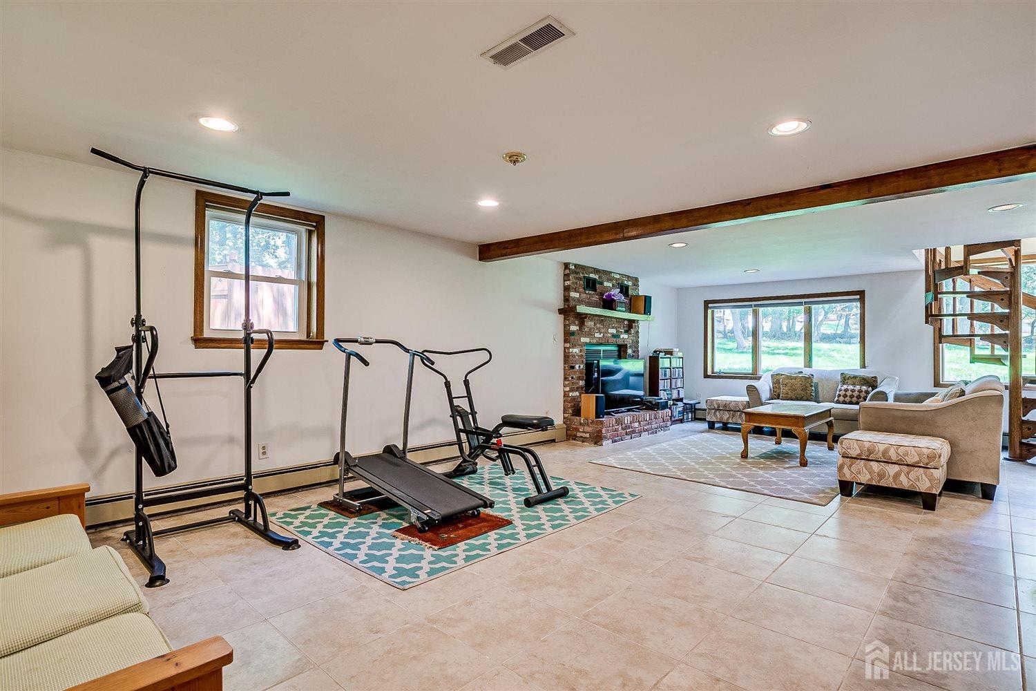 9 Fielding Place Edison, NJ 08820 - Photo 35 of 61 a view of a room with gym equipment