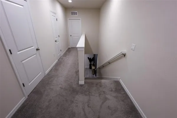 a view of entryway with stairs