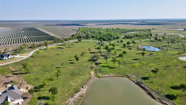 a view of a garden with an outdoor space