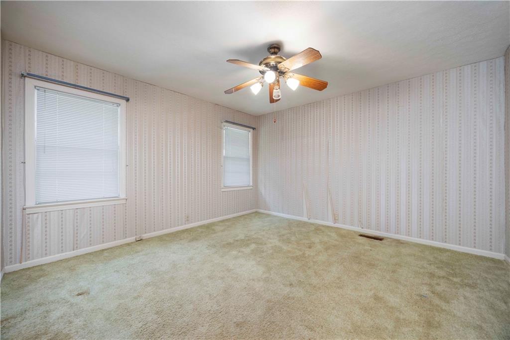 5201 Summerville Road Phenix City, AL 36867 - Photo 26 of 35 Carpeted empty room with ceiling fan