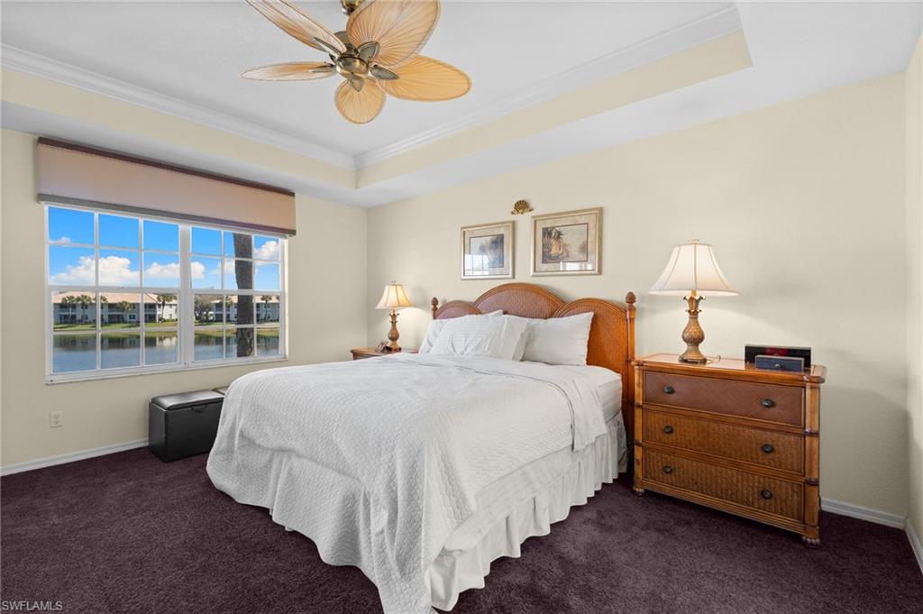 2255 Harmony Lane, Unit 204 Naples, FL 34109 - Photo 13 of 32 a bed room with a bed and a window
