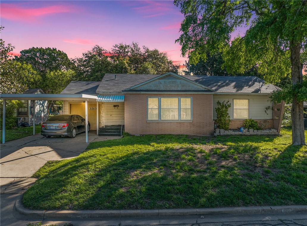 3313 Greenwood Drive Waco, TX 76708 - Photo 1 of 1 a front view of a house with garden
