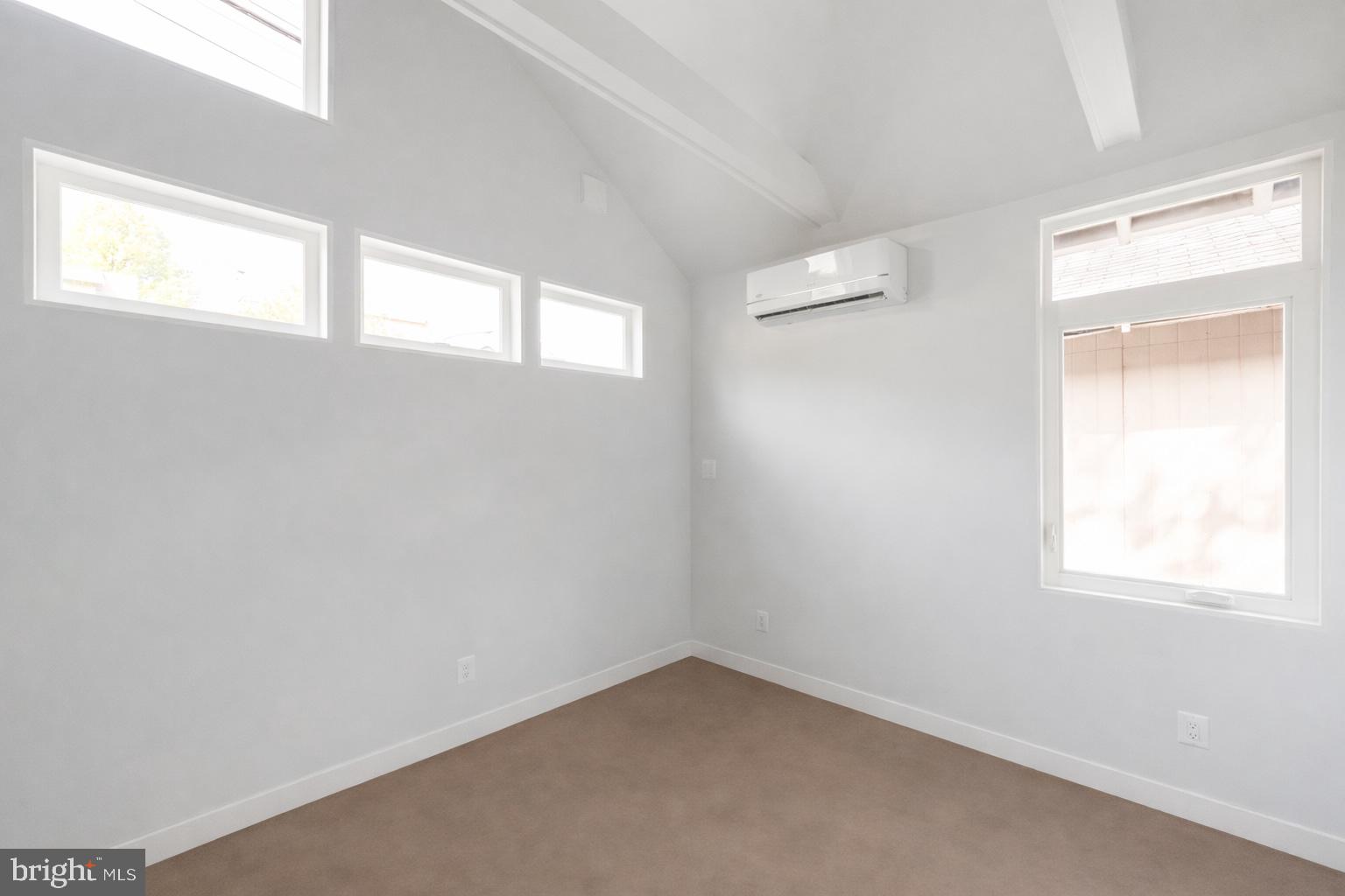 1209 Gallatin Street Northwest, Unit 2 Washington, DC 20011 - Photo 6 of 7 an empty room with a window
