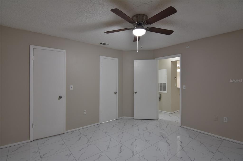 956 Salt Pond Place, Unit 303 Altamonte Springs, FL 32714 - Photo 15 of 17 an empty room with fan