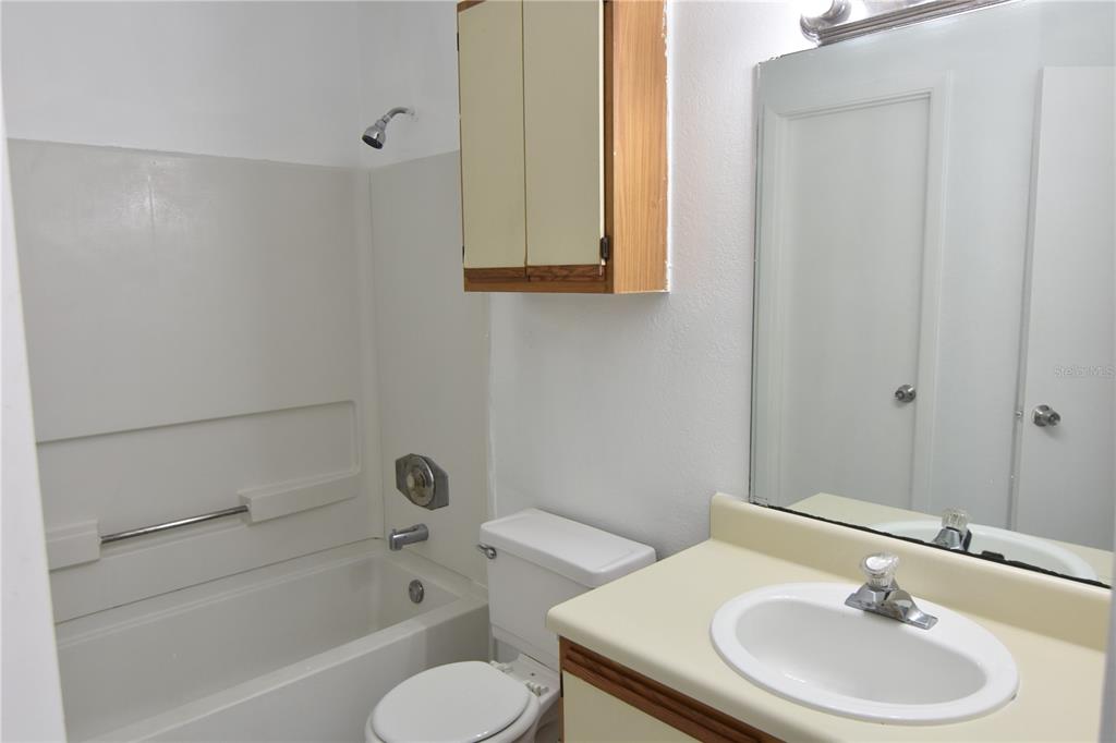 956 Salt Pond Place, Unit 303 Altamonte Springs, FL 32714 - Photo 16 of 17 a bathroom with a sink toilet and bathtub
