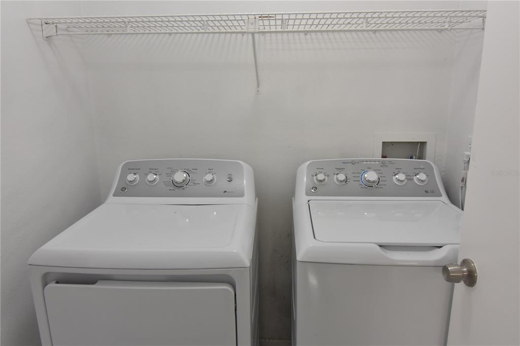 956 Salt Pond Place, Unit 303 Altamonte Springs, FL 32714 - Photo 17 of 17 a utility room with dryer and washer