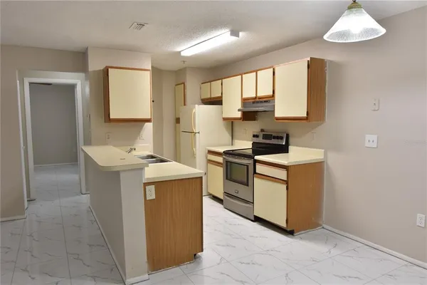 a view of a livingroom with a window