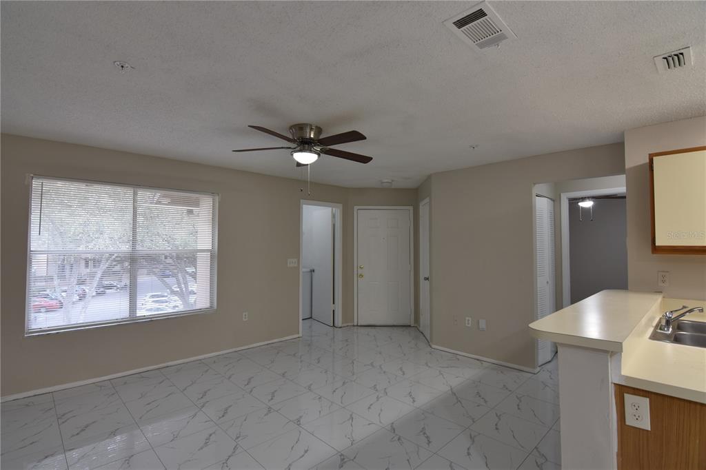 956 Salt Pond Place, Unit 303 Altamonte Springs, FL 32714 - Photo 9 of 17 a view of a livingroom with a window
