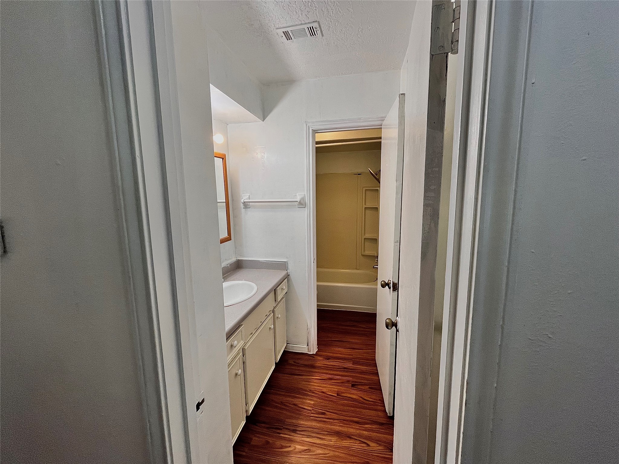 10403 White Clover Drive Houston, TX 77089 - Photo 8 of 11 a view of a bathroom from the hallway
